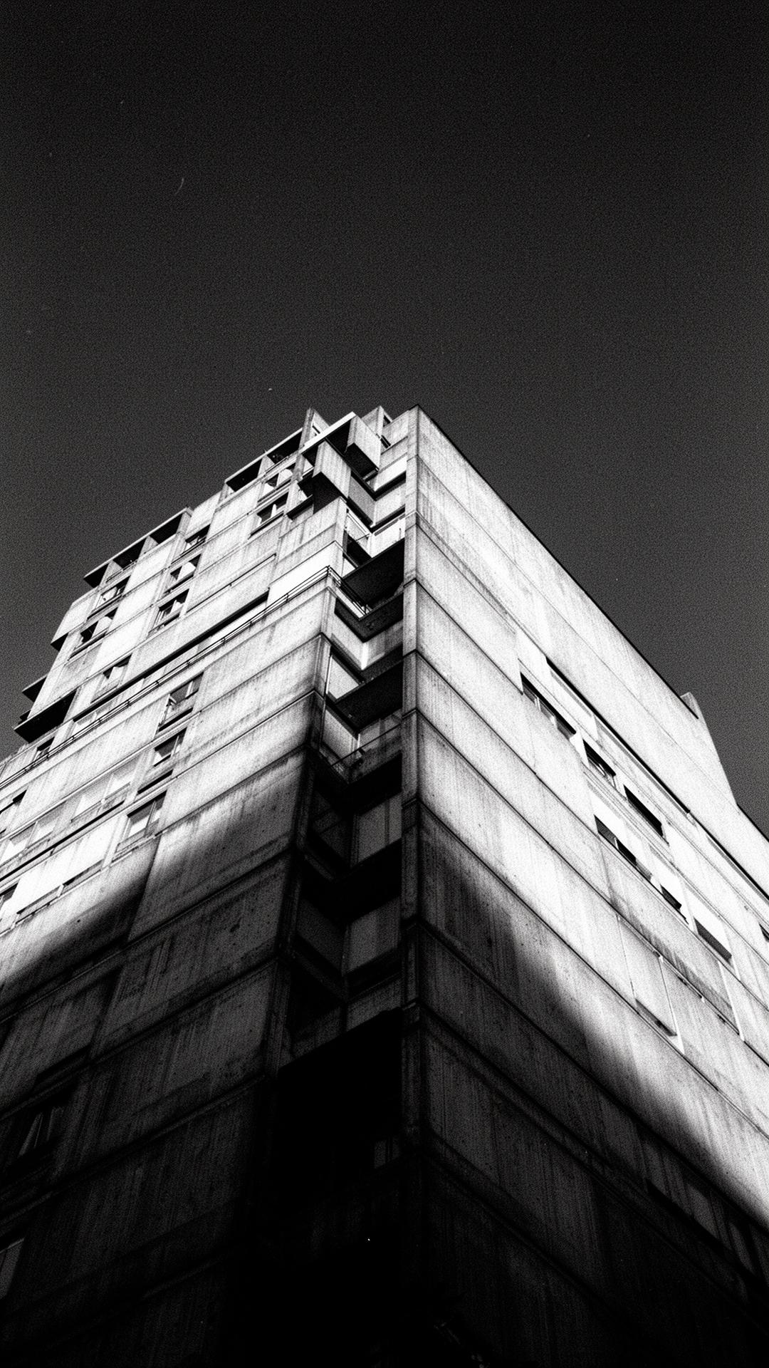 Brutalist architectural facade, monochrome